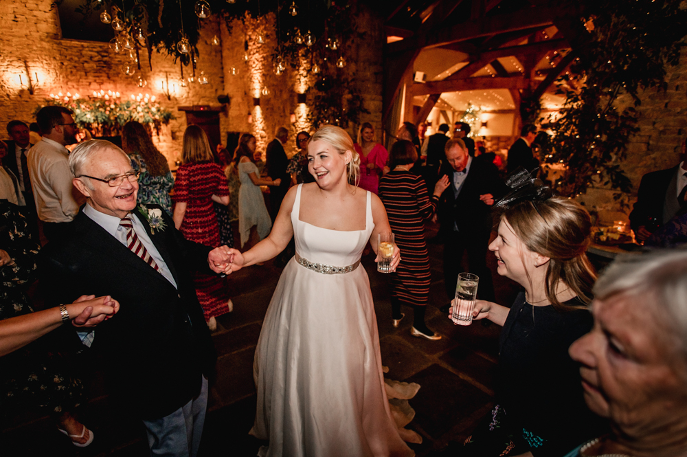 bride and grandad dancing
