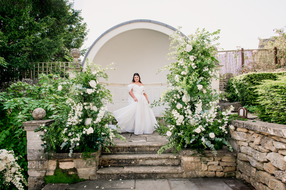 bride in white flowers painswick