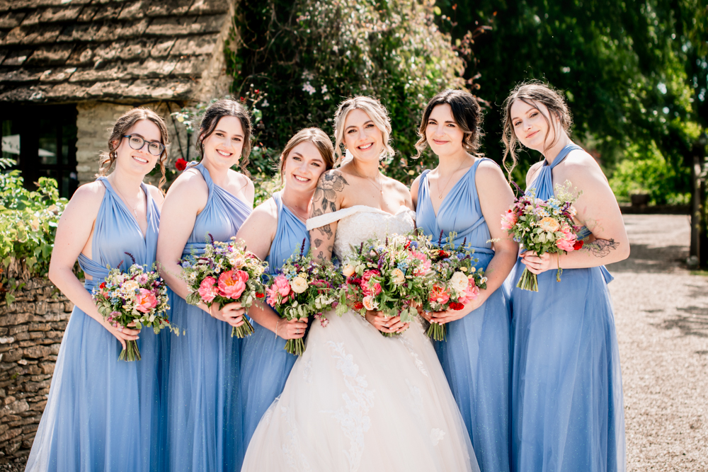 bride and bridesmaids blue dress cotswolds