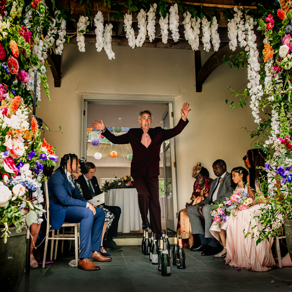 celebrant walking on bottles