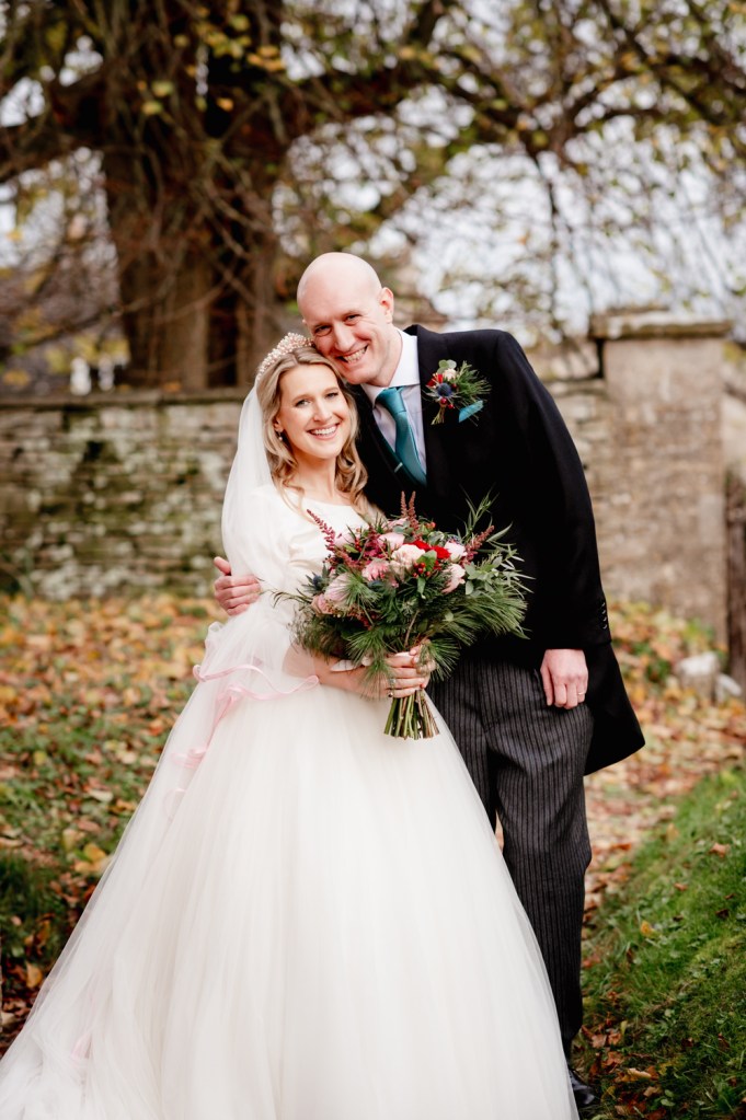 bride and groom winter wedding cotswolds