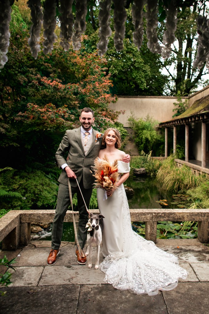 bride groom and dog  wedding matara centre cotswolds