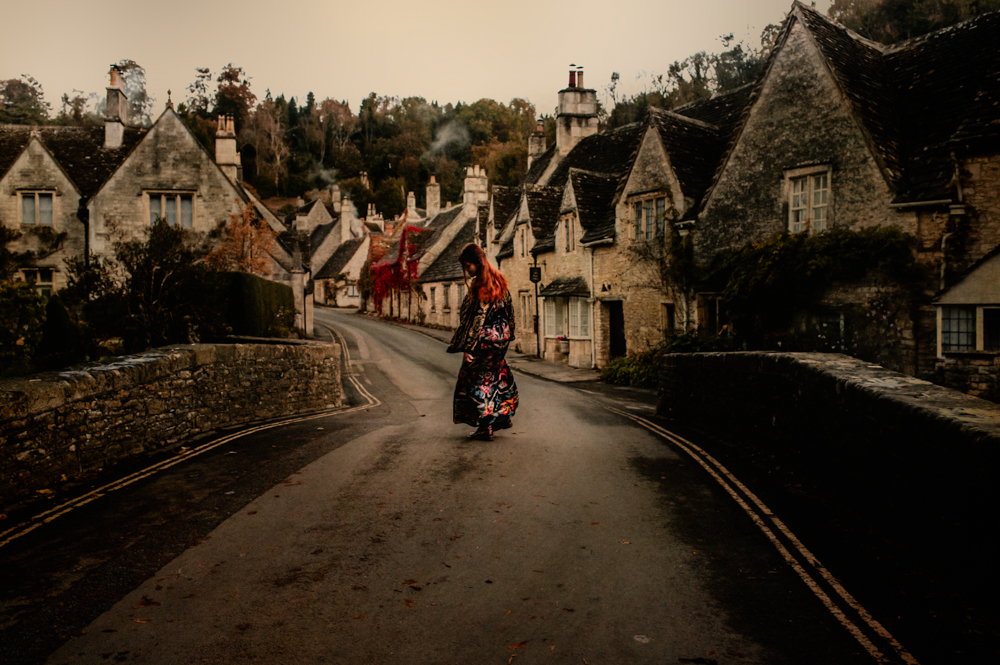 woman walking bridge dramatic