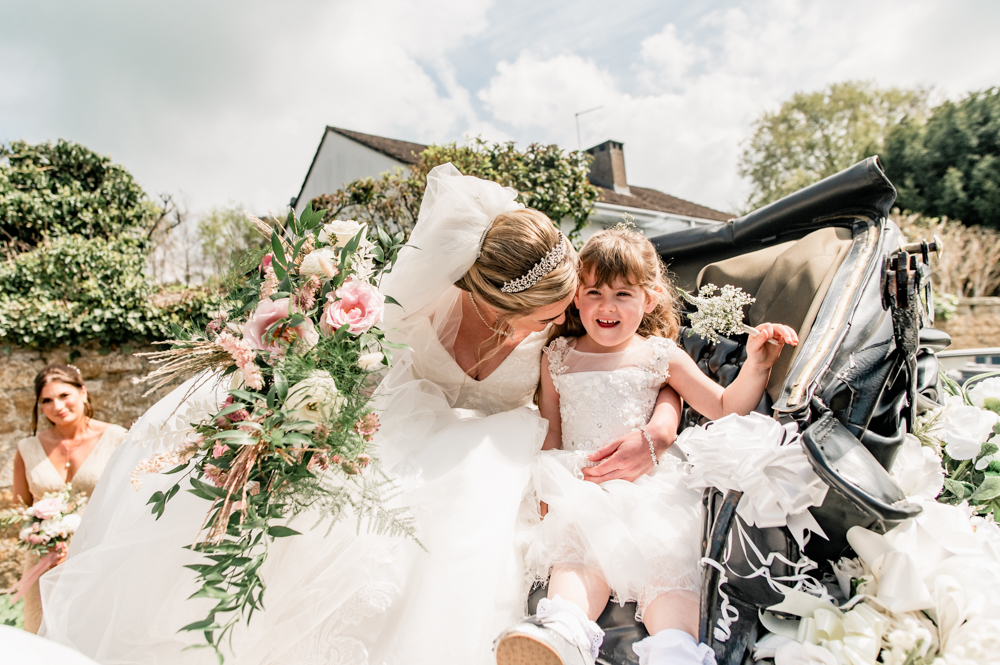 bride in wedding carriage