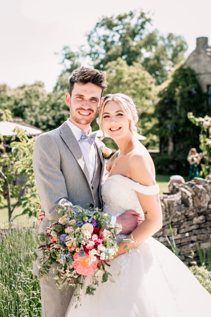 bride and groom great tythe barn cotswolds