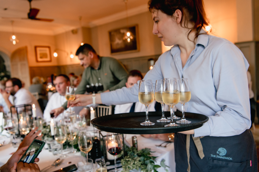 waiter with drinks painswick hotel wedding