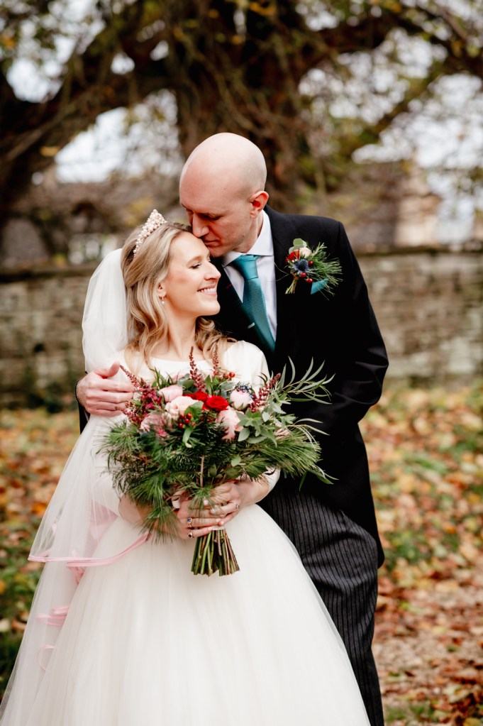 bride and groom christmas wedding cotswolds