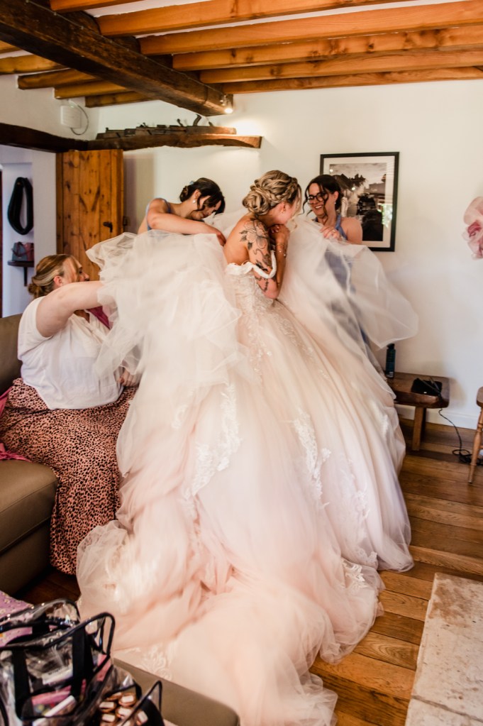 bride getting ready great tythe barn cotswolds