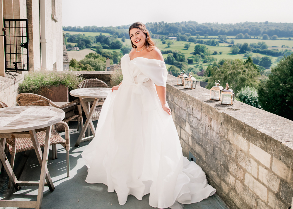 bride balcony countryside vies painswick