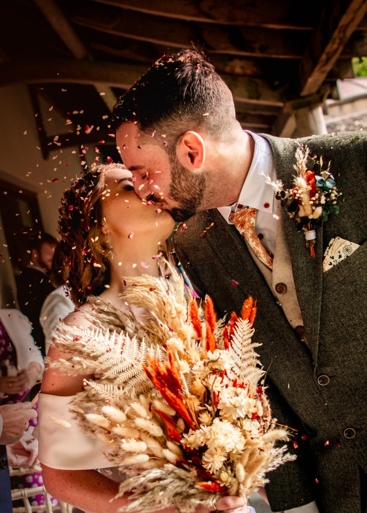 colourful confetti kiss wedding 
