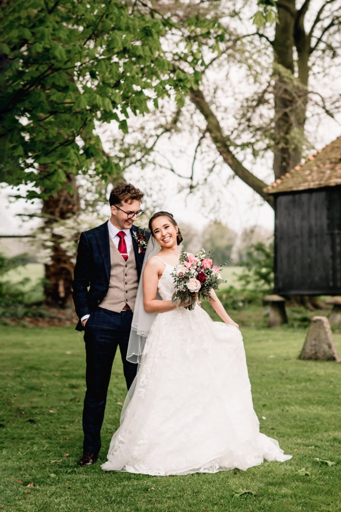 bride and groom lains barn wedding