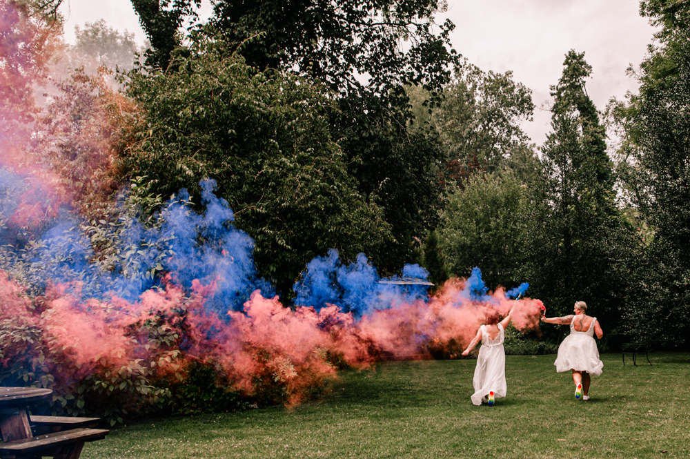 two brides rink blue smoke