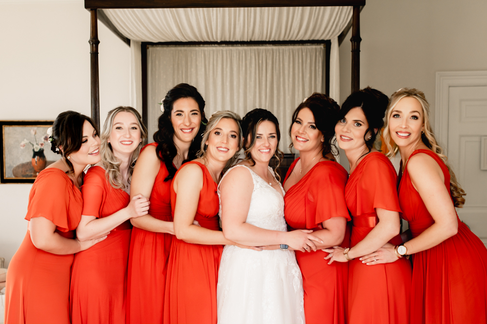 bridesmaids in orange dresses