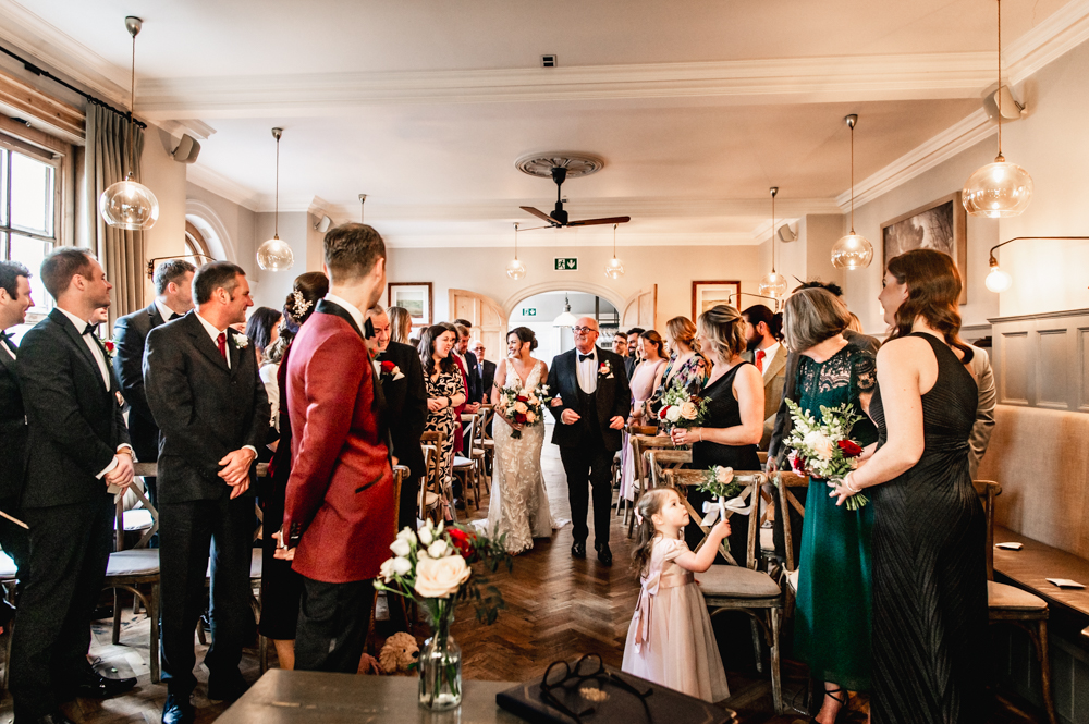 bride walking natural wedding photographer