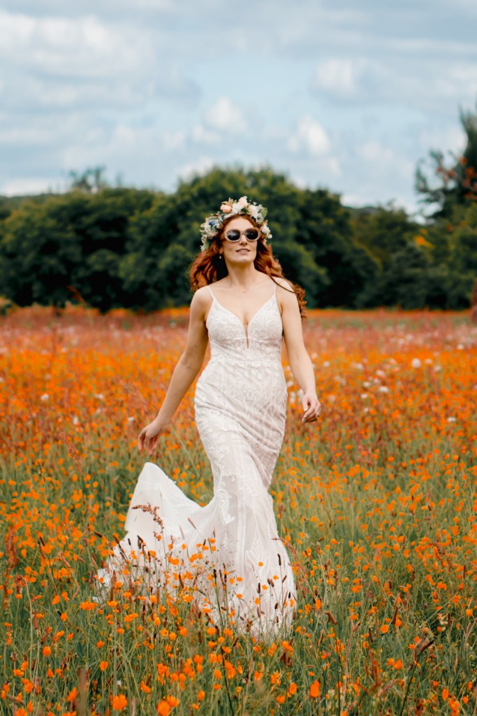 editorial wedding photography fashion shot bride in meadow
