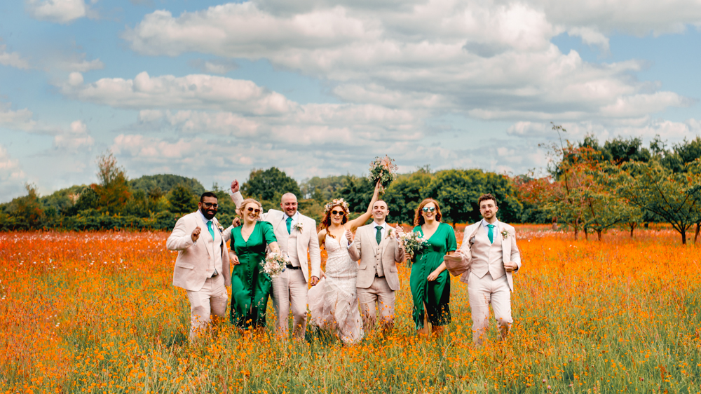 playful group shot fun relaxed wedding