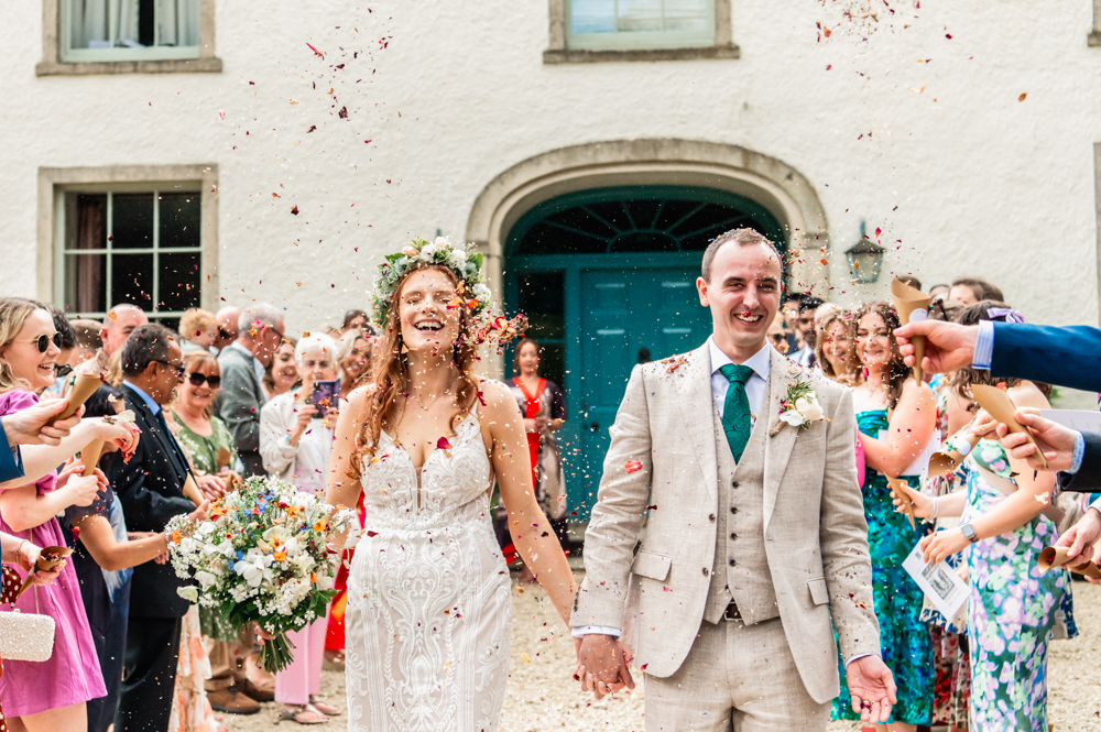 confetti happy bride and groom