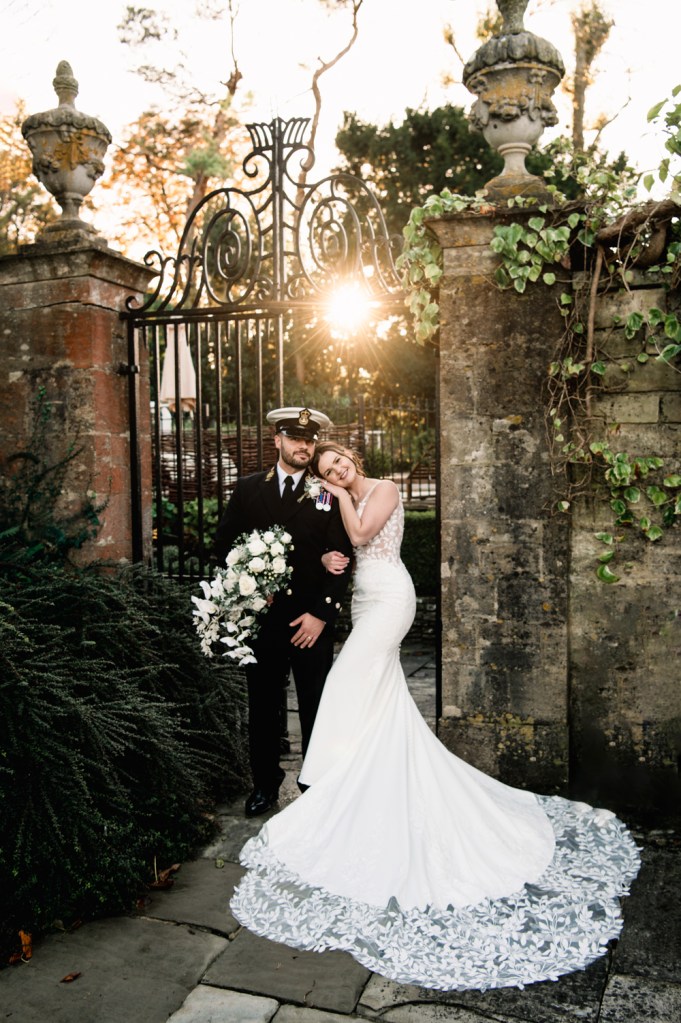 groom in military uniform sunset