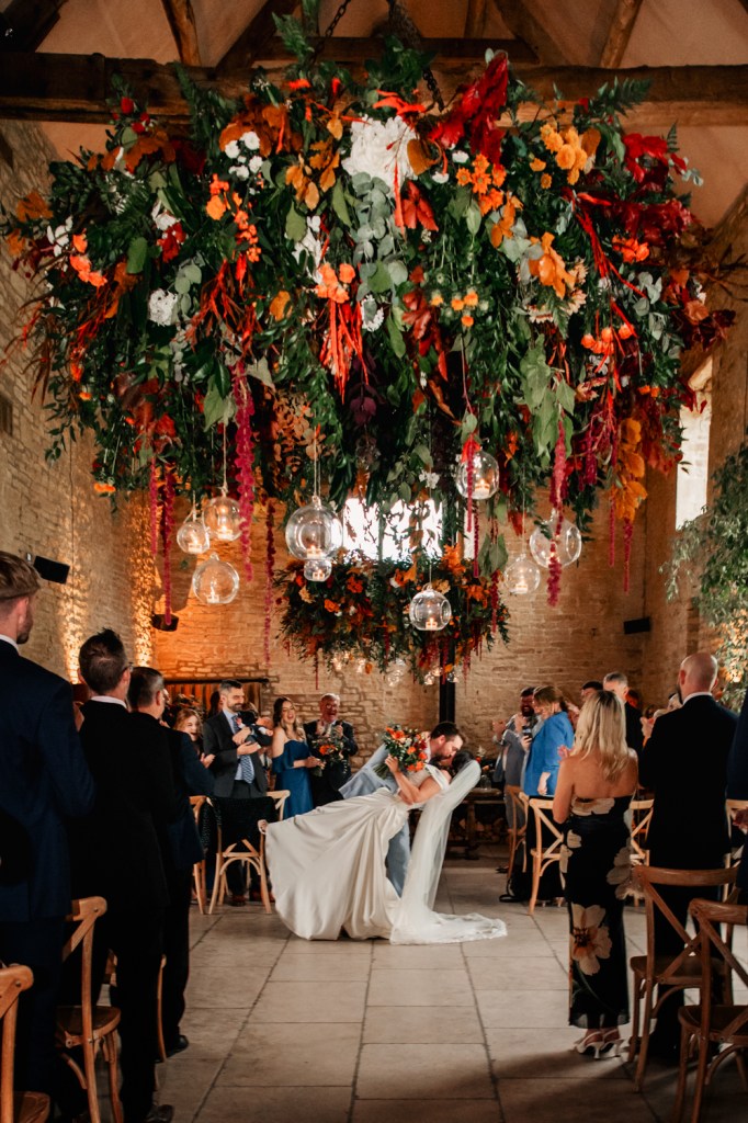 large flower wheel wedding flowers