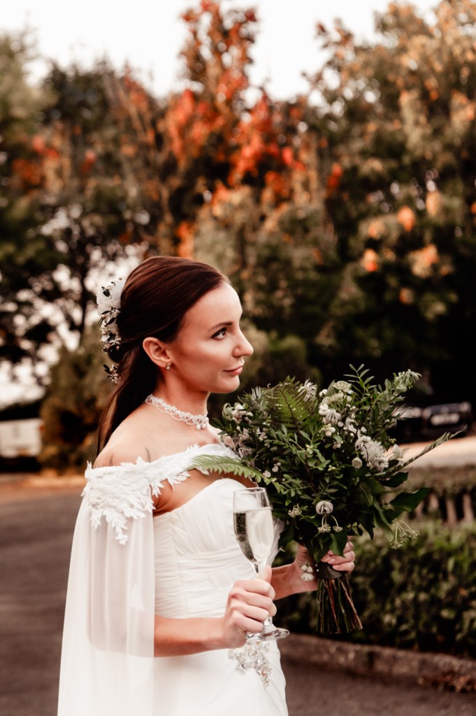 autumn wedding bride with a cape