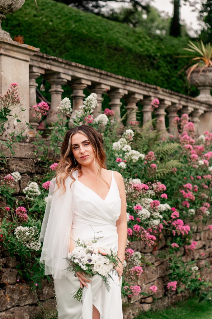 bride in a lush summer garden
