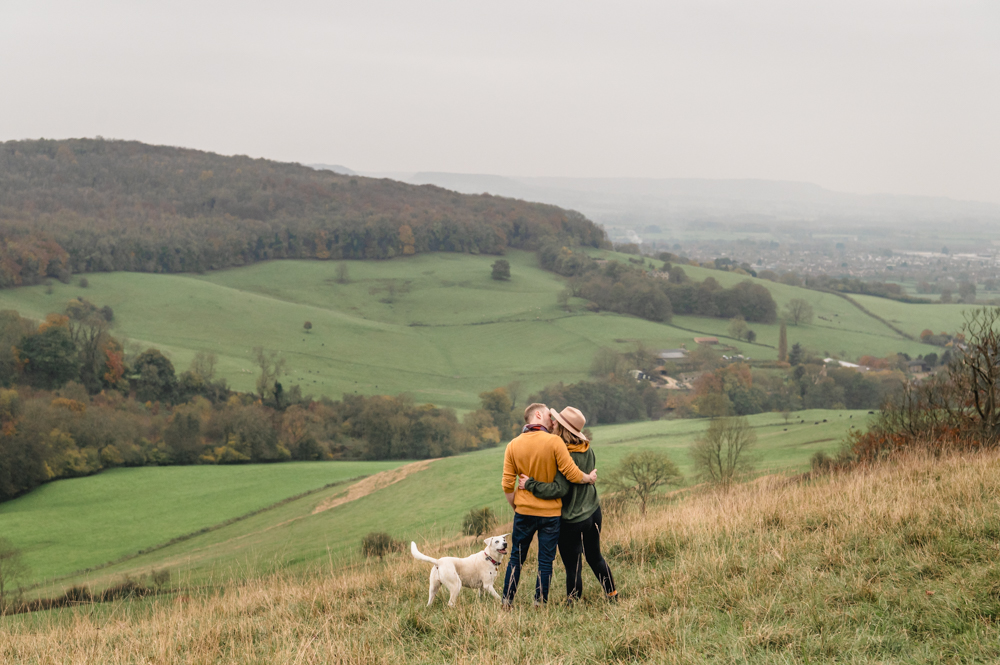 couple and dog countryside landscape