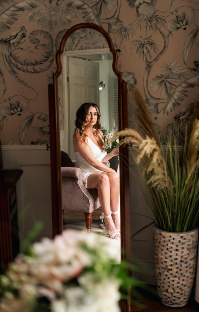 bride looking in the mirror country house hotel