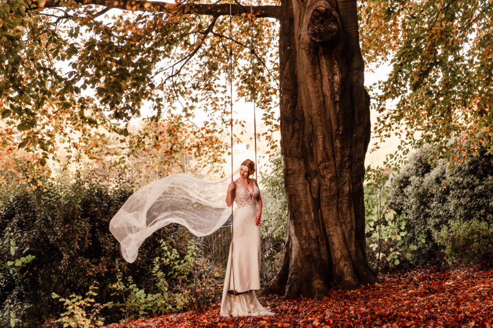 bride on swing wedding