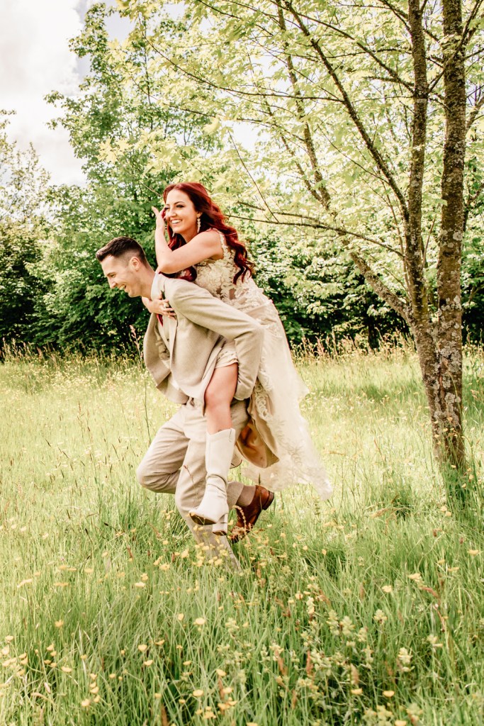 piggyback bride and groom fun wedding