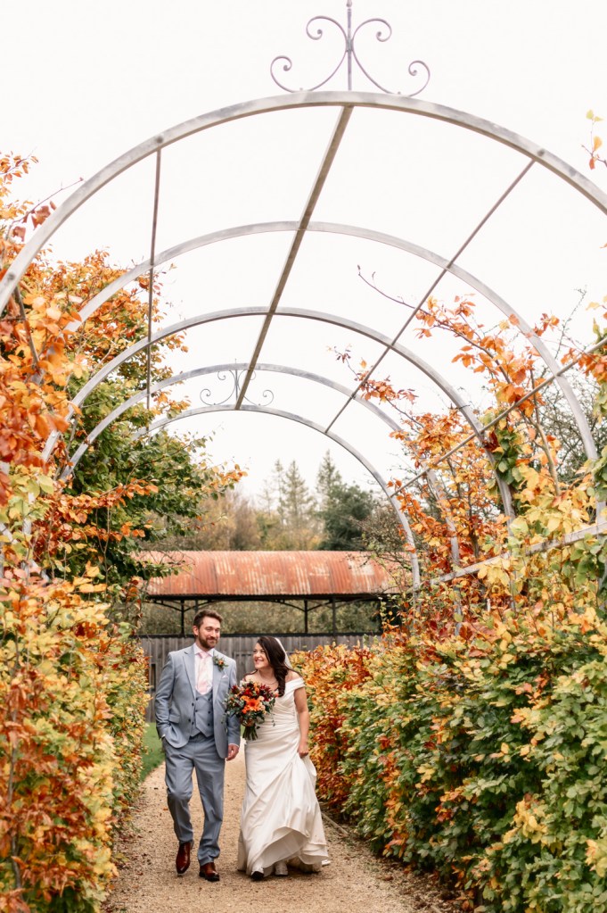 arch old gore barn bride and groom