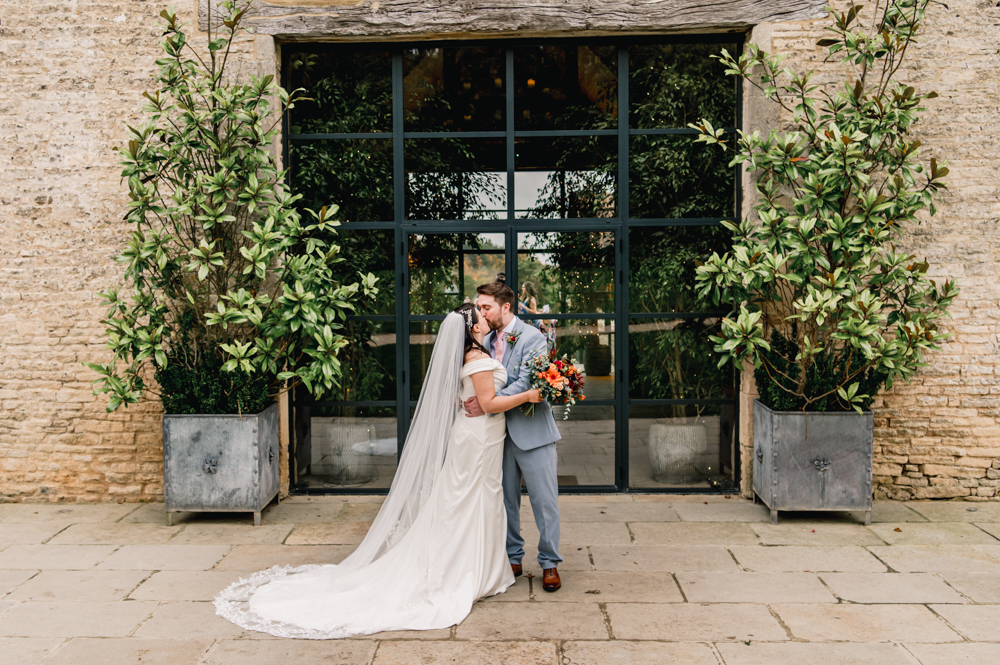 bride and groom glass door old gore barn