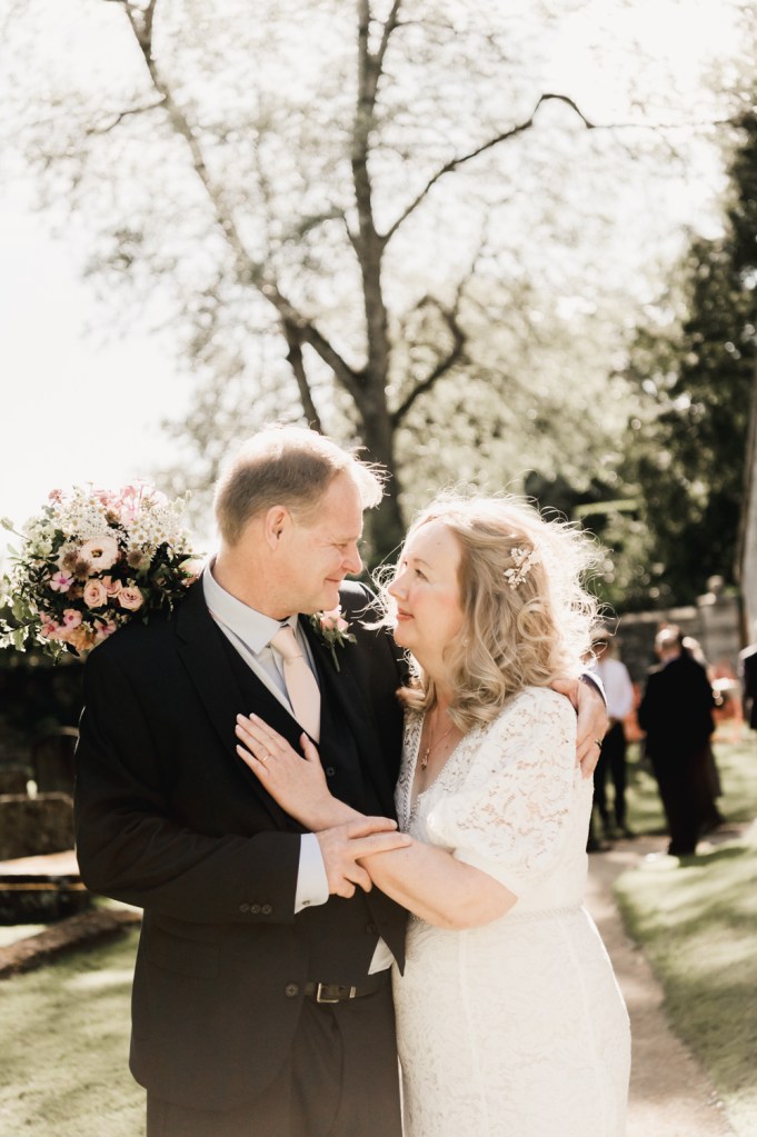 soft muted portrait of bride and groom