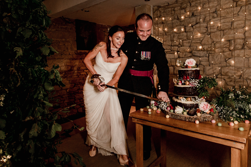 wedding cake cut with sword