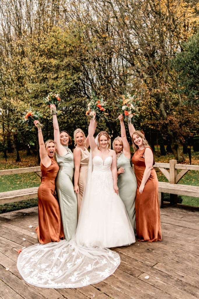 bride and  bridesmaids gold and rust wedding