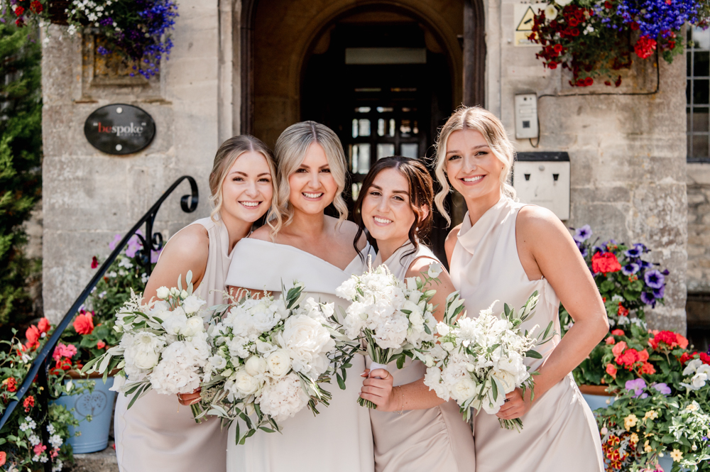 bride with bridesmaids Stonehouse court hotel wedding
