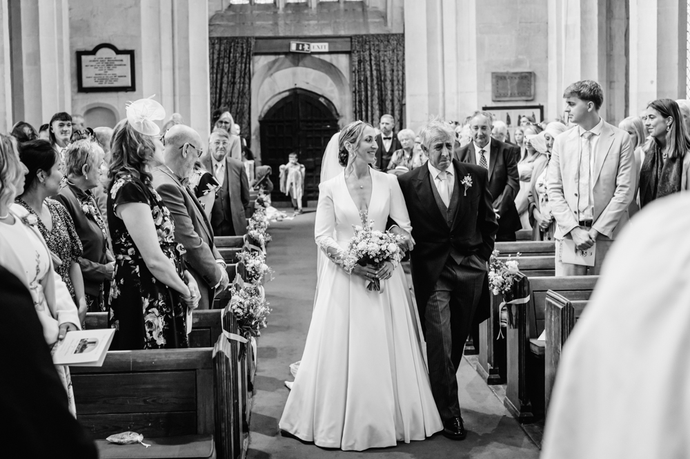 bride walking down the aisle candid wedding photos