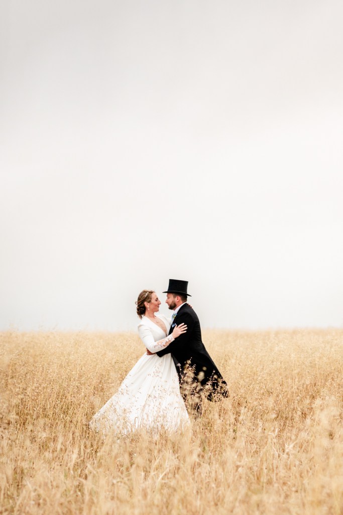 bride and groom wheat field