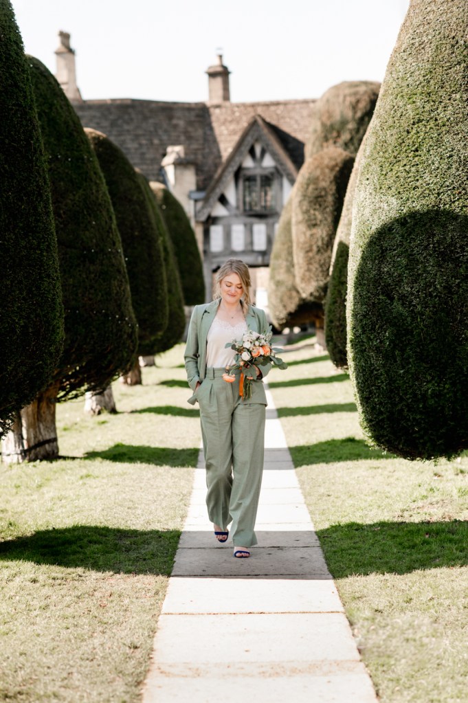 bride in green trouser suit cotswold wedding