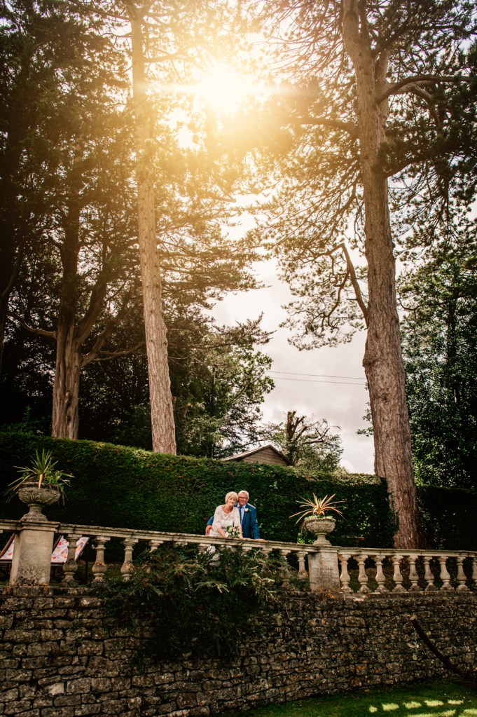 bride and groom tall trees 