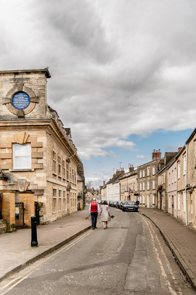 cotswold street couple walking
