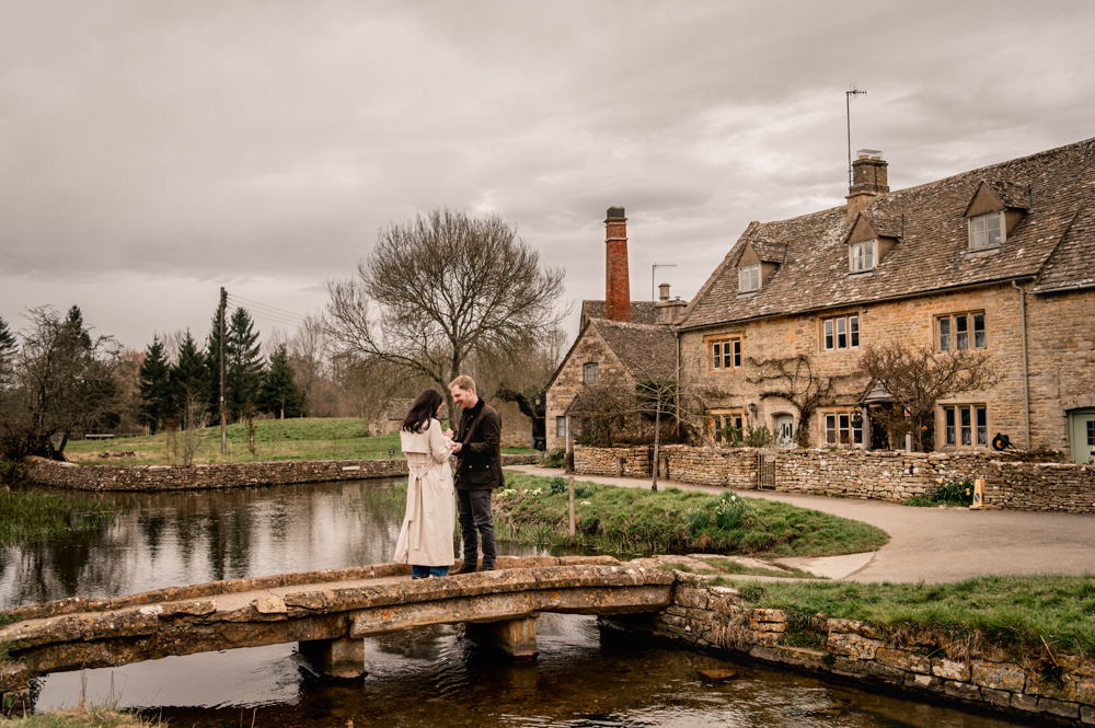 romantic proposal on a bridge cotswolds