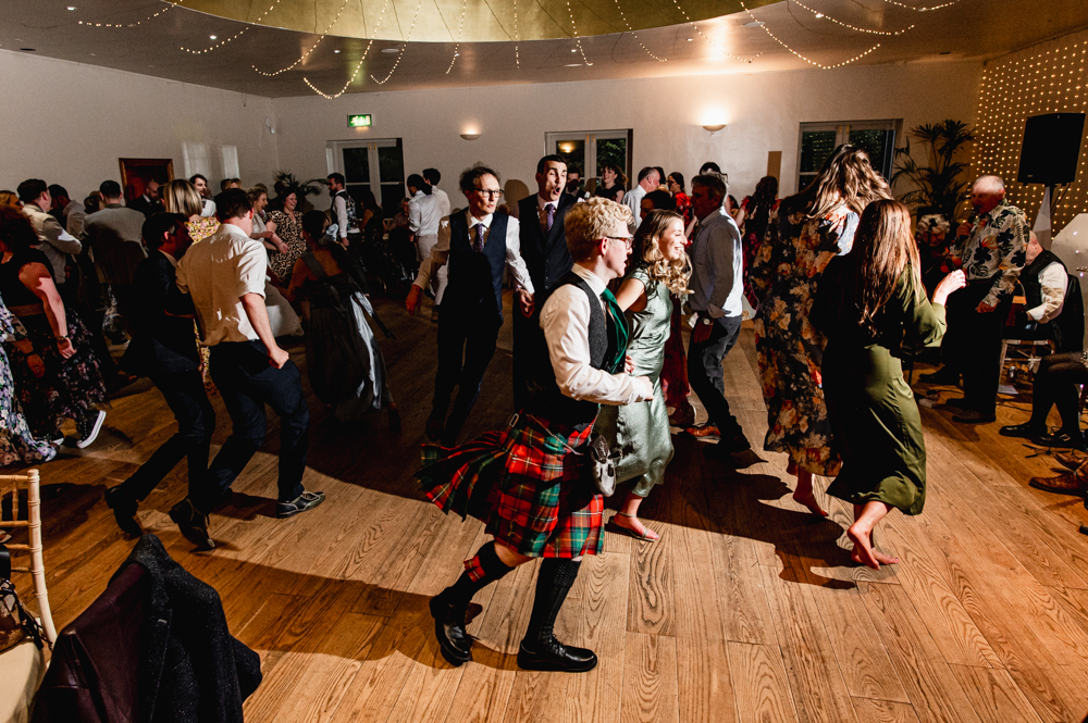 ceilidh dancing natural wedding photography