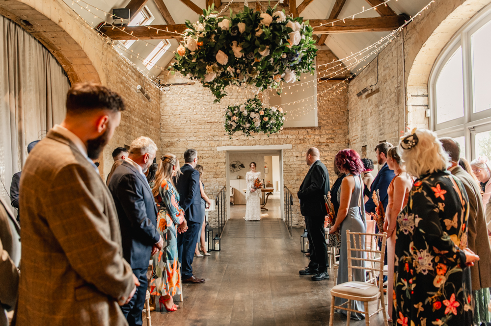 bride walking down the aisle lapstone barn
