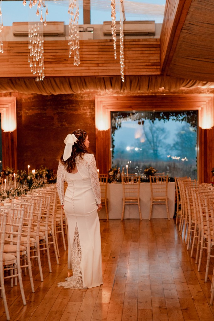 bride walking among tables cotswolds wedding elmore