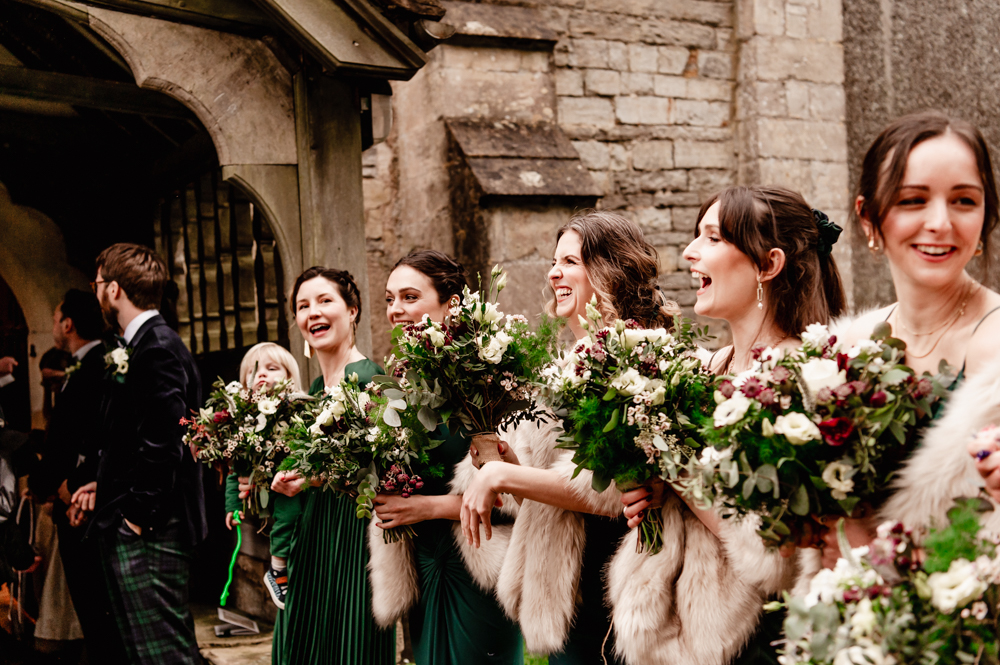 bridesmaids in green winter wedding cotswolds