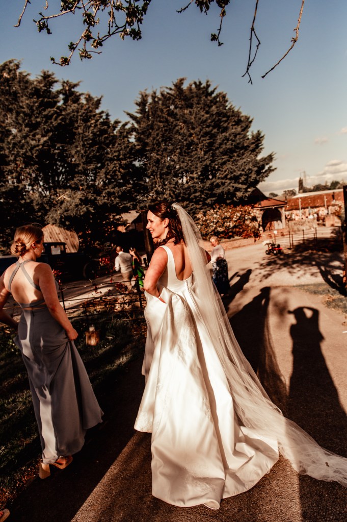 savvy bride at sunset  dramatic wedding photography
