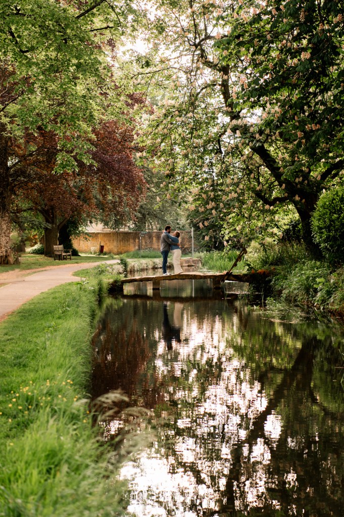 cotswold bridge couple hugging
