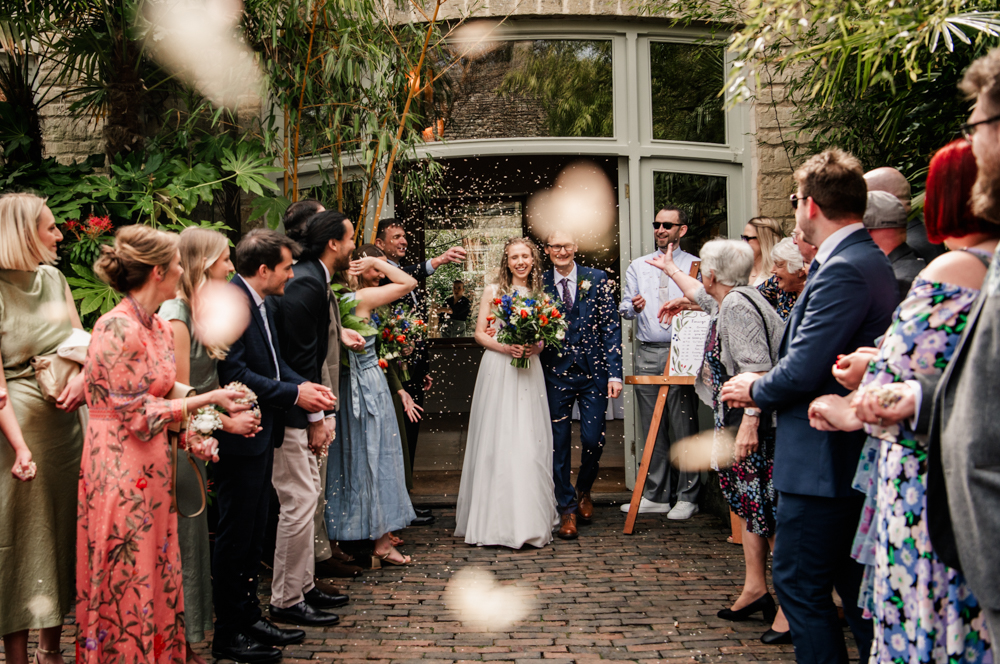 bride and groom confetti shot  Matara centre wedding photography