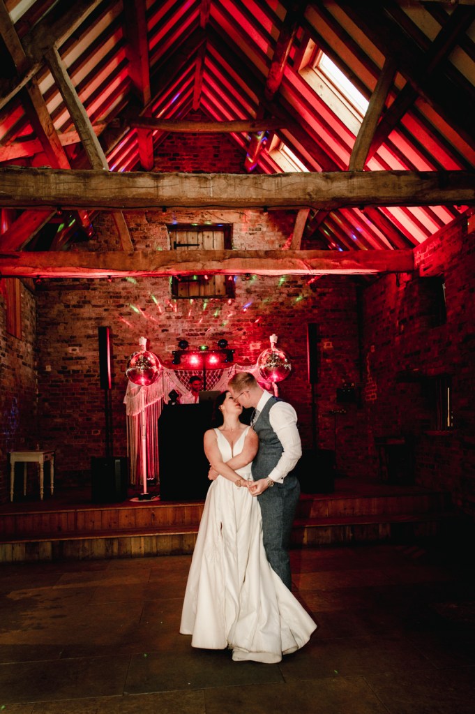 bride and groom first dance at milton end barns natural  wedding photography