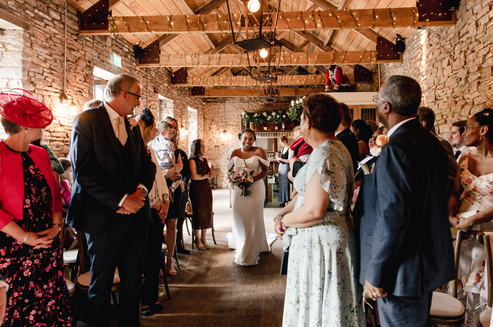 bride walking down the aisle rustic barn white horse hambrook